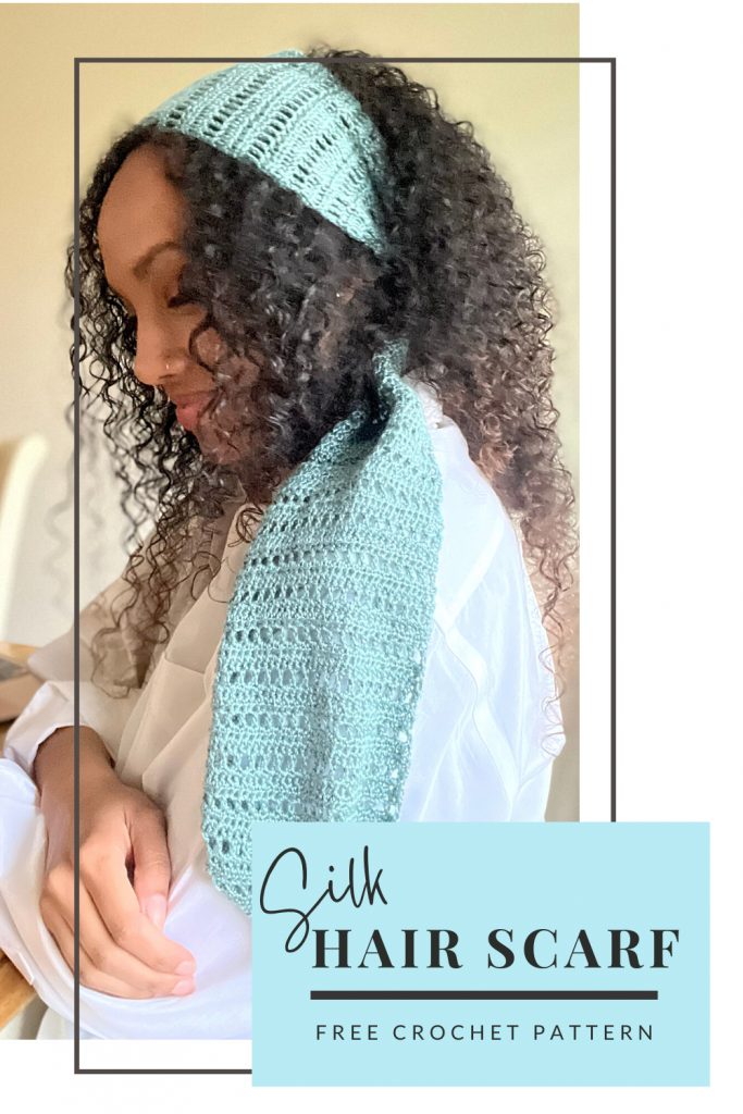 model with curly hair wearing light blue hair scarf